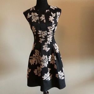 Black dress with tan flower appliqués